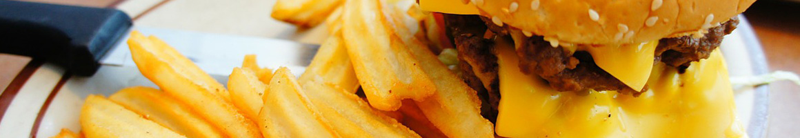 Eating Burger at Lonestar Cheeseburger Co restaurant in San Angelo, TX.